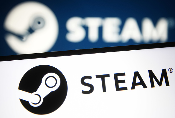 UKRAINE - 2021/07/24: In this photo illustration a Steam logo of a video game digital distribution service is seen on a smartphone and a pc screen. (Photo Illustration by Pavlo Gonchar/SOPA Images/LightRocket via Getty Images)